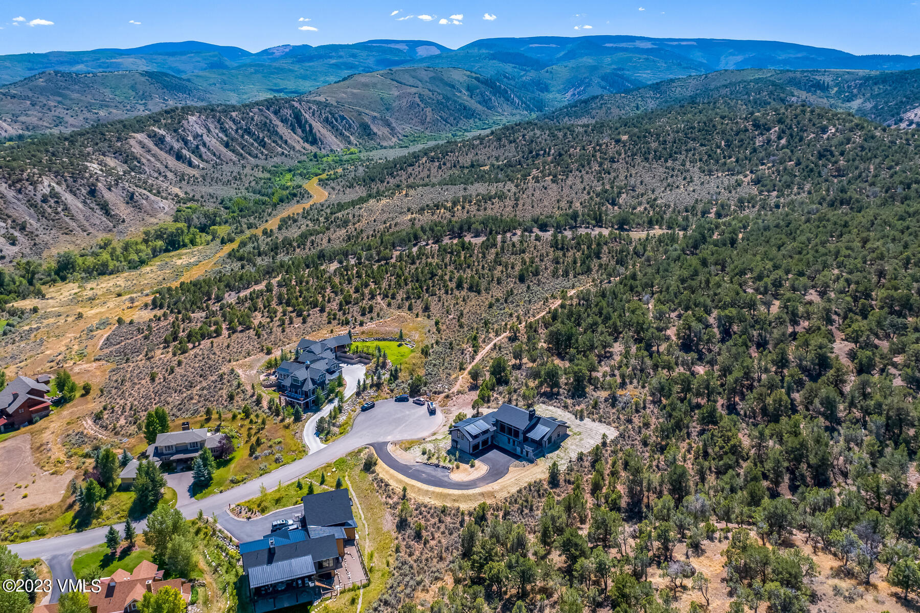 125 Silver Spur Eagle, CO 81631 - Photo 20 of 48 a view of an outdoor sitting area with a lake