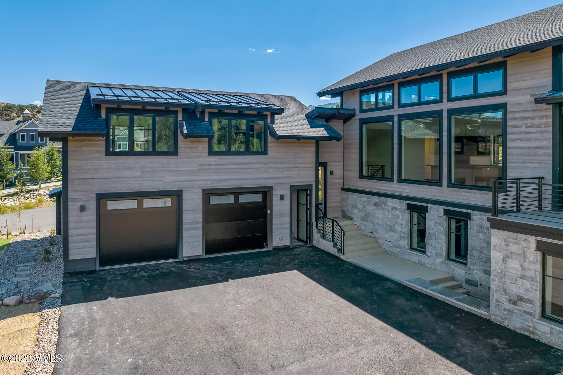 125 Silver Spur Eagle, CO 81631 - Photo 23 of 48 a front view of a house with a garden