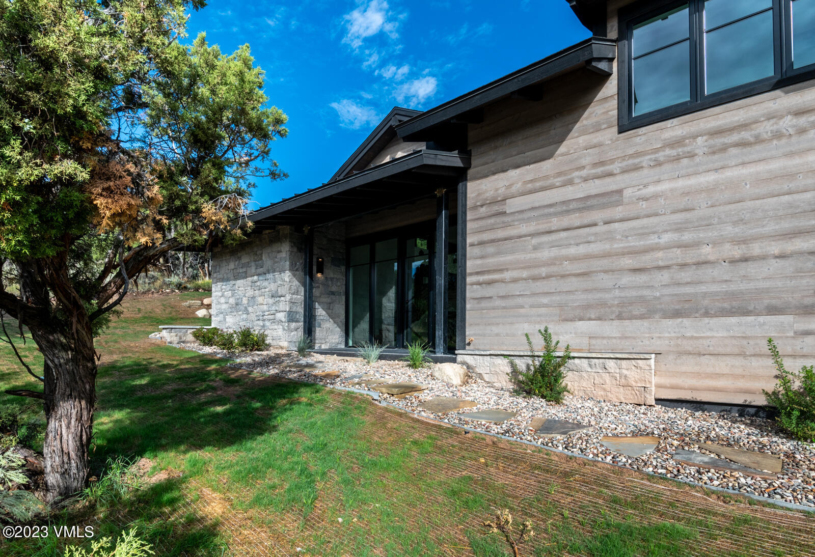 125 Silver Spur Eagle, CO 81631 - Photo 31 of 48 a view of yellow house with a yard