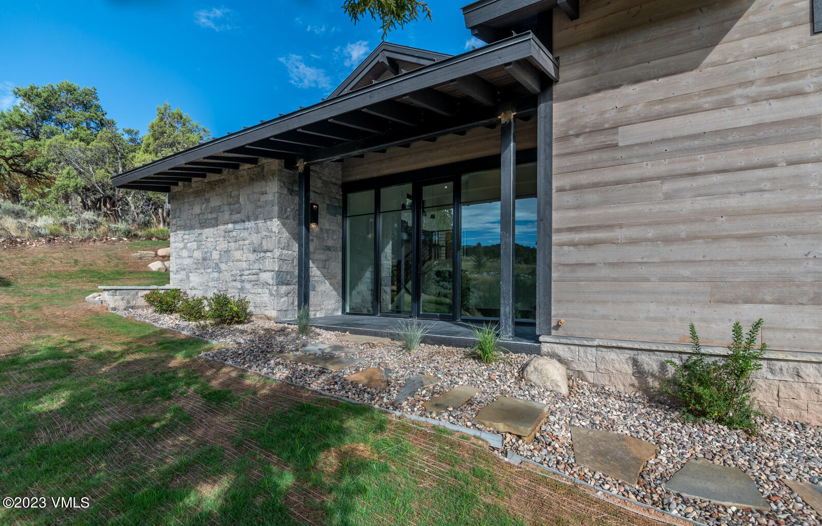 125 Silver Spur Eagle, CO 81631 - Photo 32 of 48 a front view of a house with garden