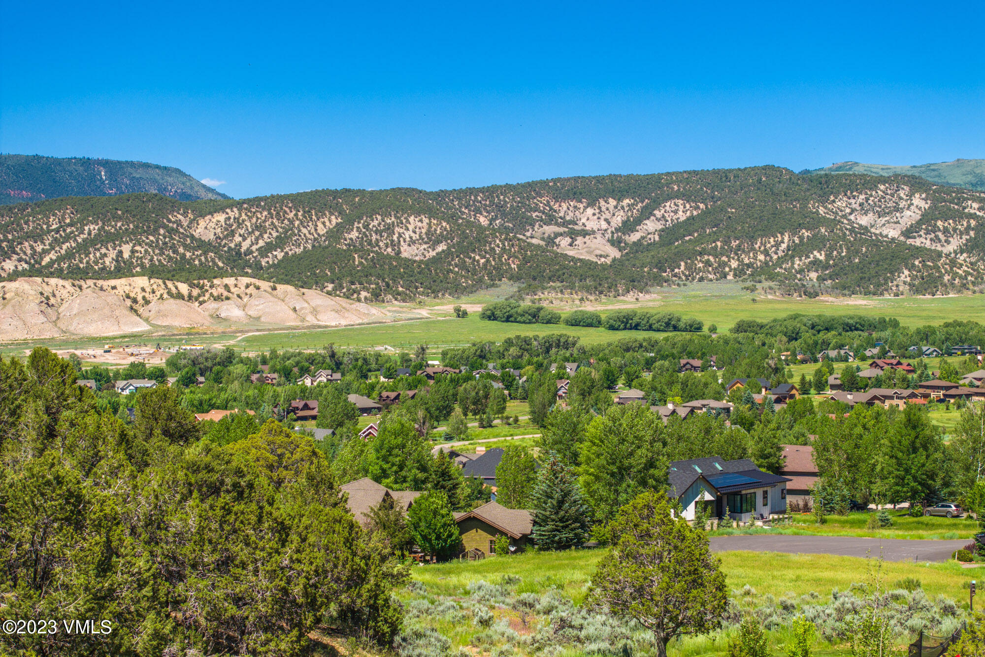 125 Silver Spur Eagle, CO 81631 - Photo 42 of 48 a view of a city with mountains in the background