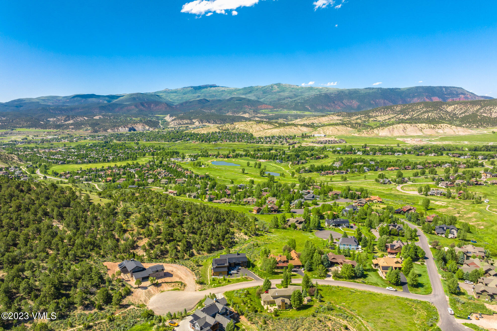 125 Silver Spur Eagle, CO 81631 - Photo 45 of 48 a view of a city with mountains in the background
