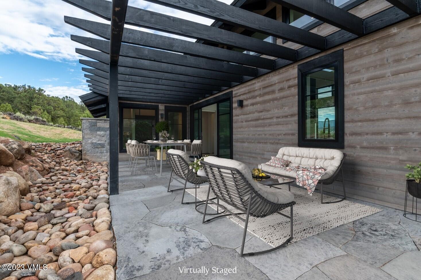 125 Silver Spur Eagle, CO 81631 - Photo 6 of 48 a view of a patio with couple of chairs