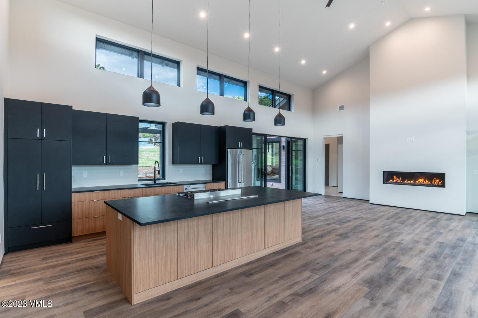 125 Silver Spur Eagle, CO 81631 - Photo 8 of 48 a kitchen with stainless steel appliances granite countertop a sink and a stove