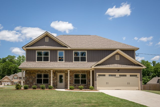 8 Fast Lane Fort Mitchell, undefined 36856 - Photo 1 of 44 a front view of a house with a yard and garage