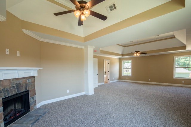 8 Fast Lane Fort Mitchell, undefined 36856 - Photo 28 of 44 a view of a livingroom with a fireplace and a ceiling fan