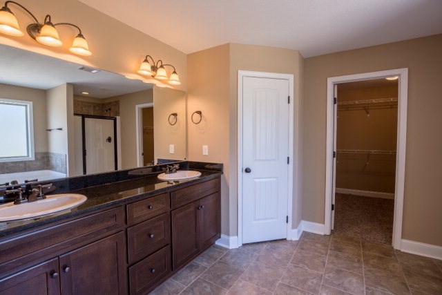 8 Fast Lane Fort Mitchell, undefined 36856 - Photo 30 of 44 a bathroom with a granite countertop sink and a mirror