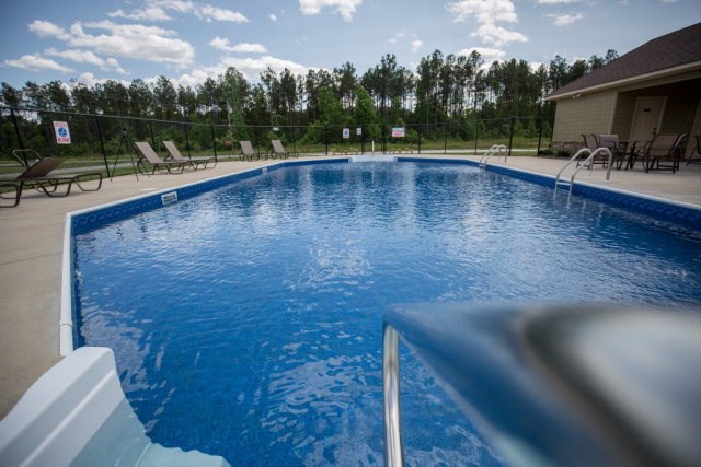 8 Fast Lane Fort Mitchell, undefined 36856 - Photo 44 of 44 a view of a swimming pool with a patio and a yard