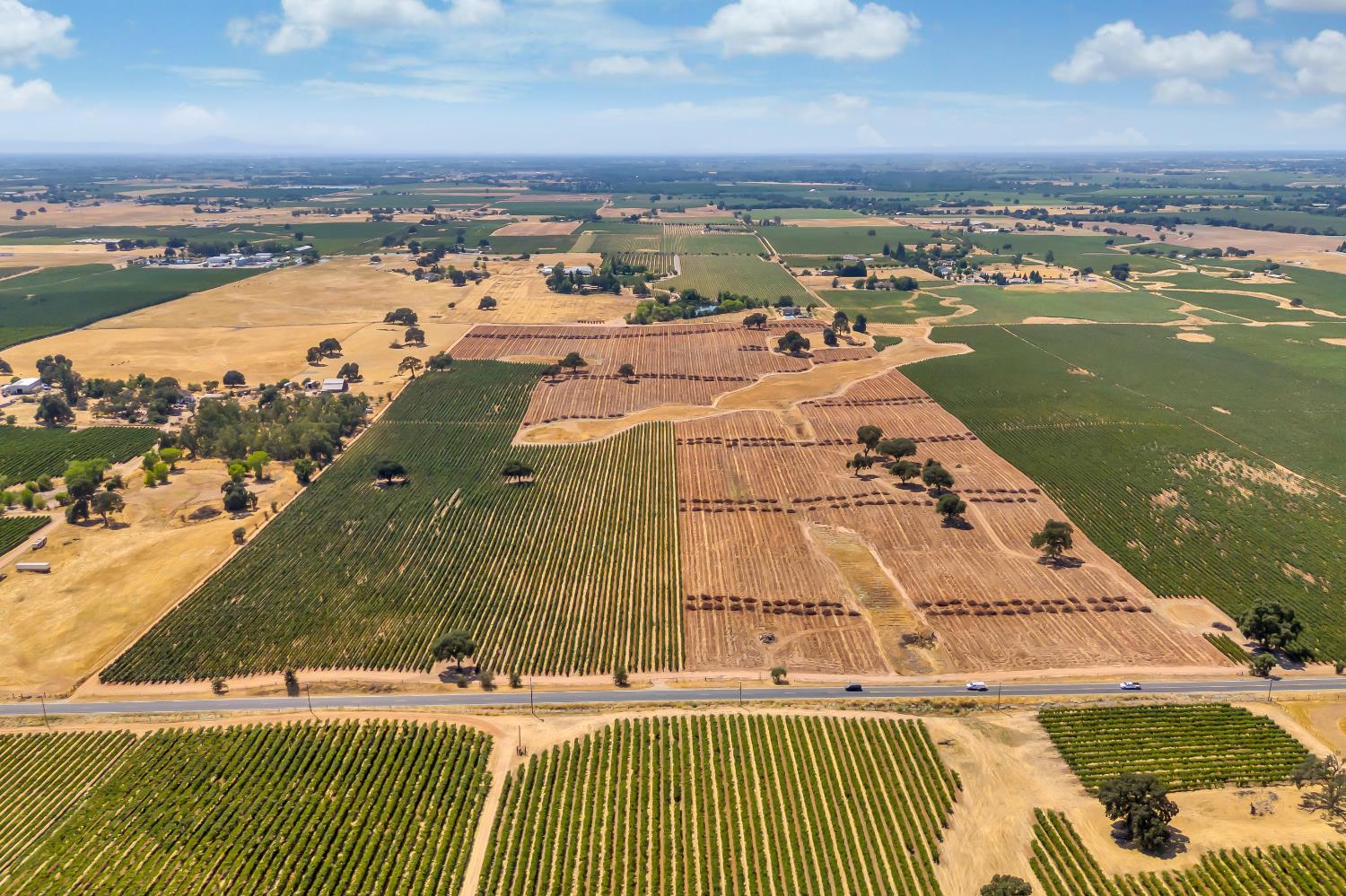 19301 Clements Road Lodi, CA 95240 - Photo 3 of 23 an aerial view of residential houses with outdoor space