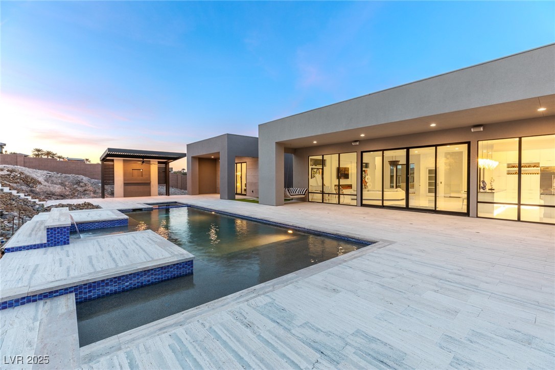 1455 MacDonald Ranch Drive Henderson, NV 89012 - Photo 43 of 46 Outdoor pool with a hot tub