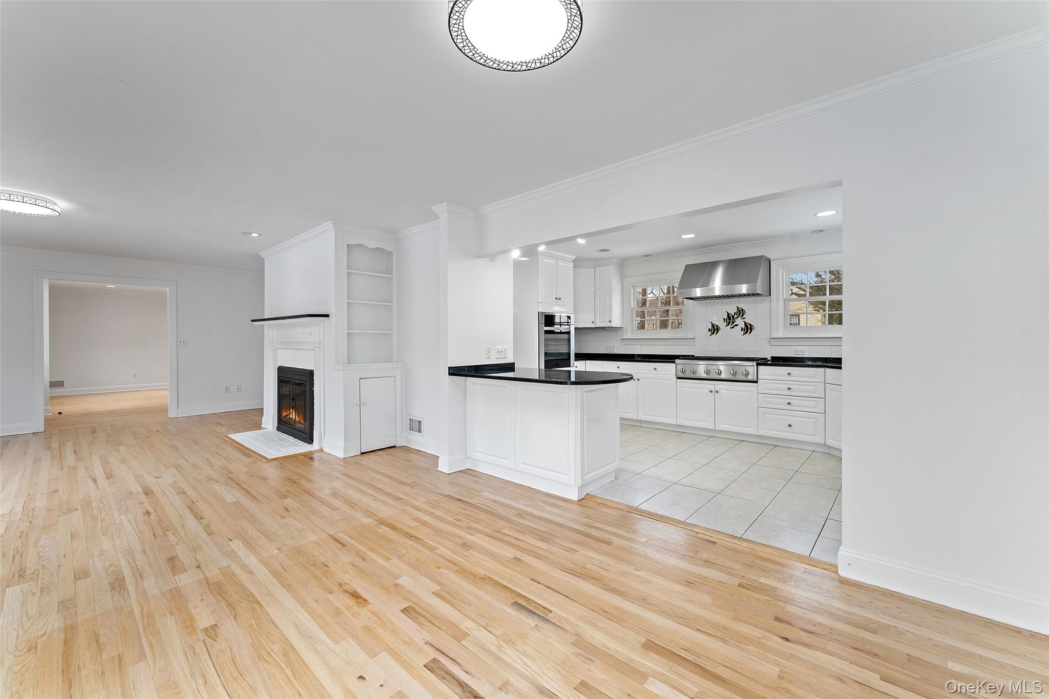 14 Wakefield Road Scarsdale, NY 10583 - Photo 8 of 27 Dining area, kitchen and den - all open flow