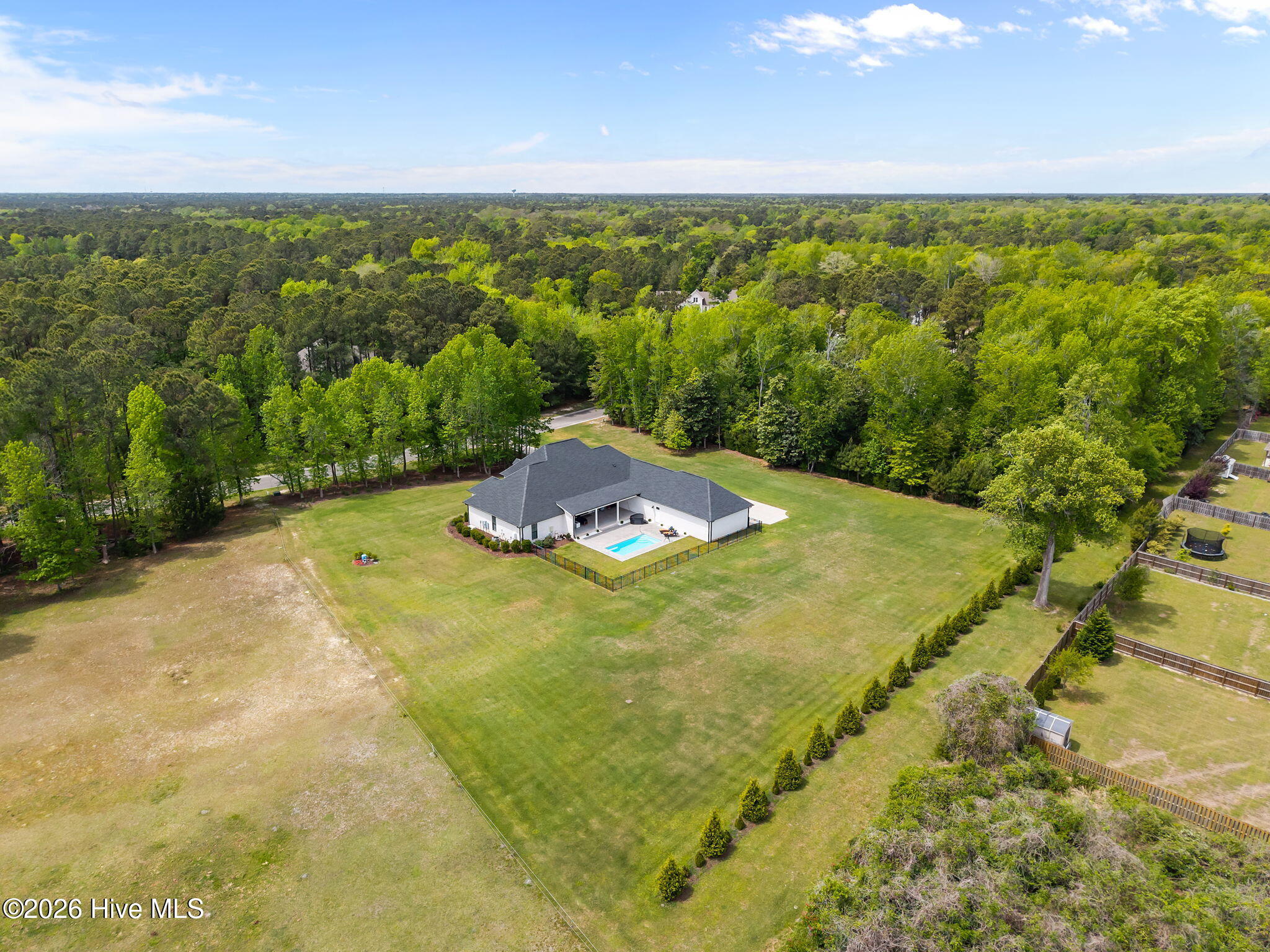 47 East Rolling Meadows Road Hampstead, NC 28443 - Photo 7 of 89 24-web-or-mls-DJI_20260413125510_0691_D