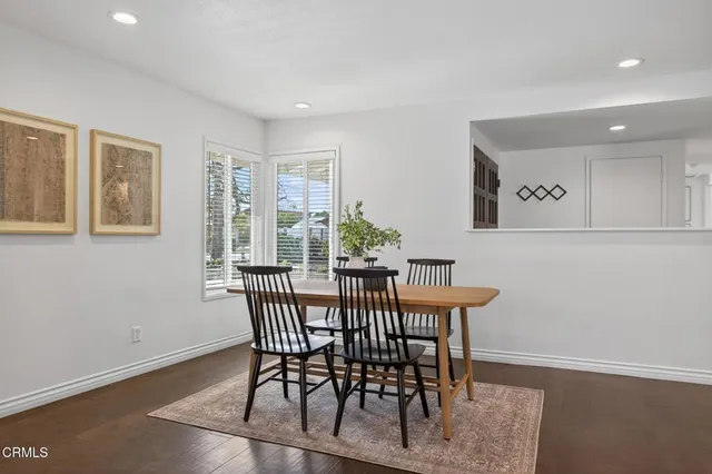 a view of a dining room with furniture
