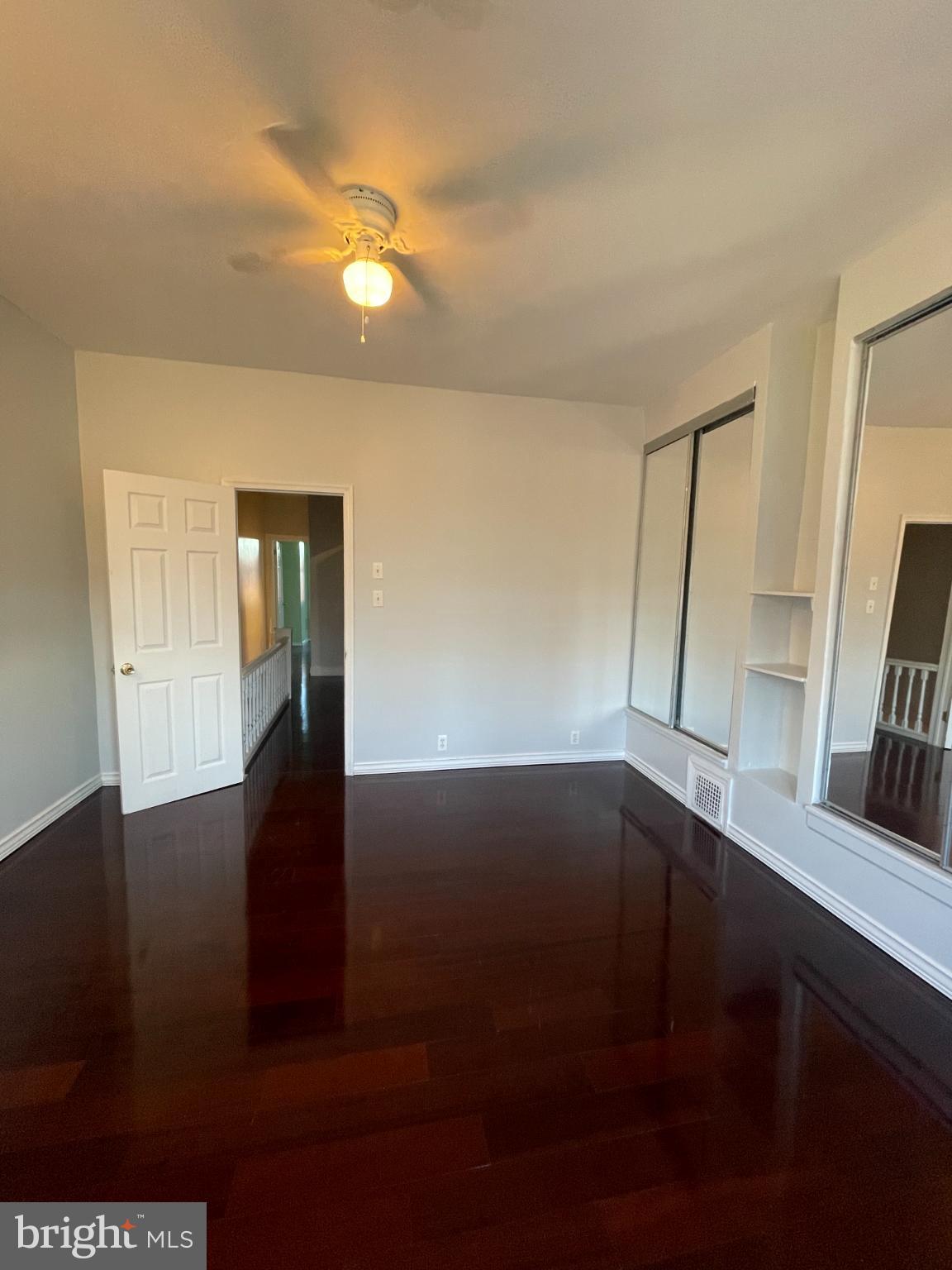 5410 Kingsessing Avenue Philadelphia, PA 19143 - Photo 17 of 17 Spacious room with elegant hardwood floors.