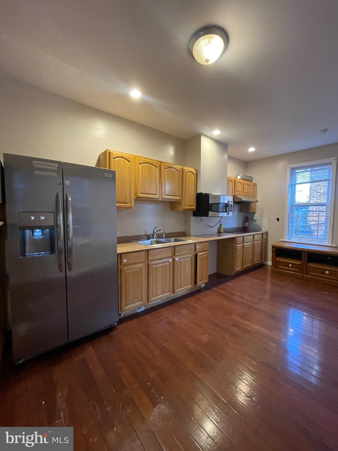 5410 Kingsessing Avenue Philadelphia, PA 19143 - Photo 7 of 17 Bright and spacious kitchen with modern finishes.