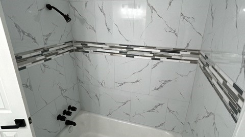 6330 Cobalt Street Houston, TX 77016 - Photo 18 of 29 a bathroom with a shower