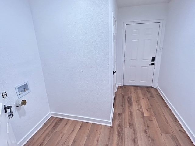 6330 Cobalt Street Houston, TX 77016 - Photo 26 of 29 a view of a room with wooden floor