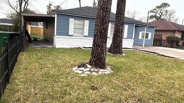 6330 Cobalt Street Houston, TX 77016 - Photo 5 of 29 a view of a house with backyard and sitting area