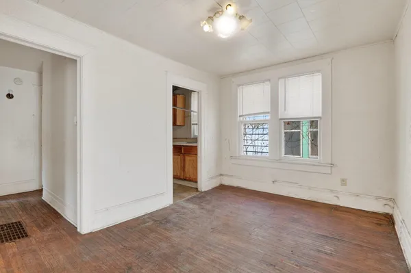 a view of an empty room with a window