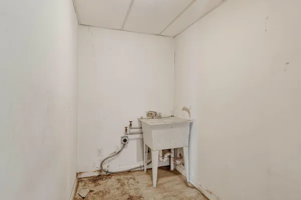 a room with a table and chairs
