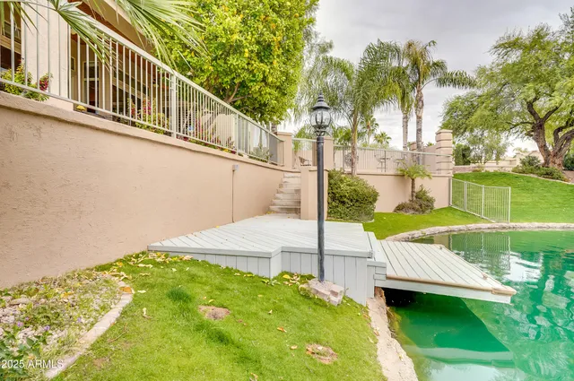 a view of swimming pool with a patio