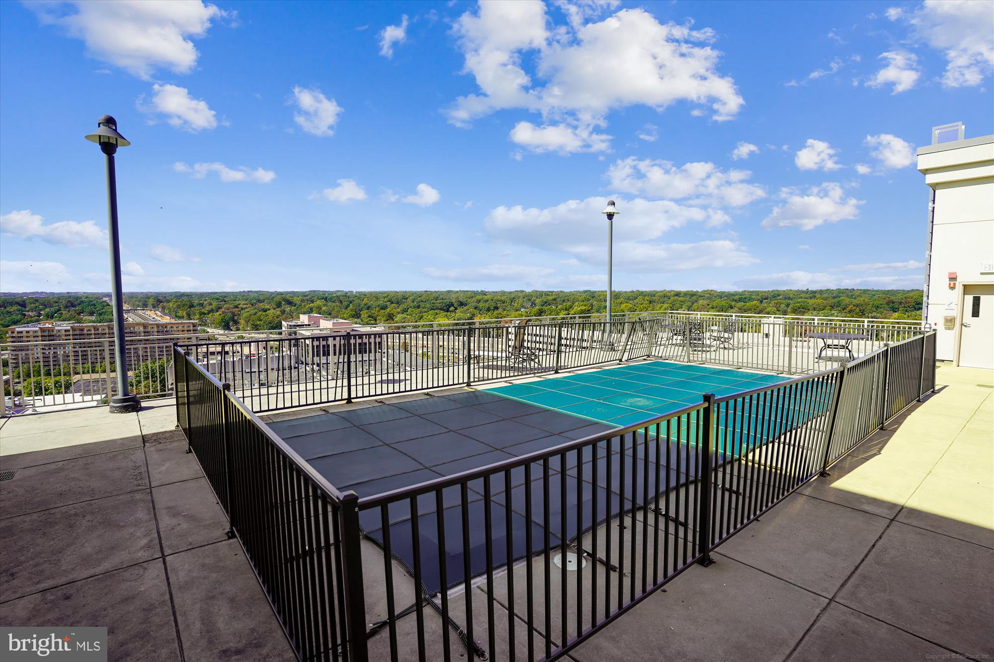 2726 Gallows Road, Unit 113 Vienna, VA 22180 - Photo 21 of 29 a view of a balcony with an ocean view