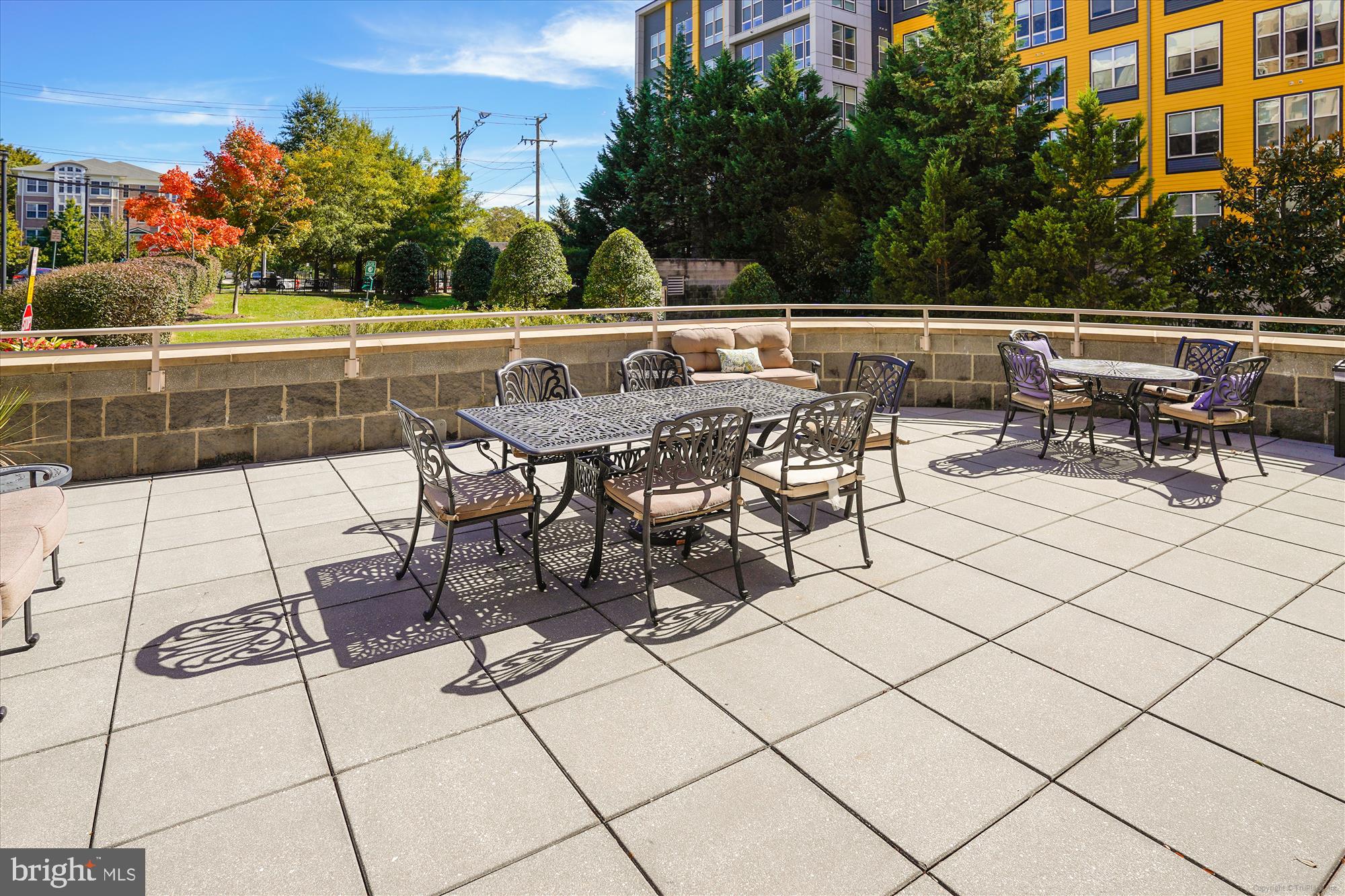 2726 Gallows Road, Unit 113 Vienna, VA 22180 - Photo 22 of 29 a view of a terrace with furniture and outdoor space