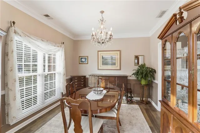 a kitchen with refrigerator cabinets and a sink