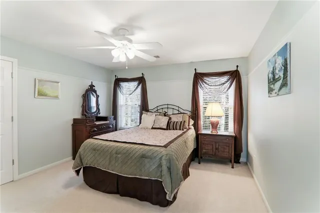 a bathroom with a sink a mirror and a vanity