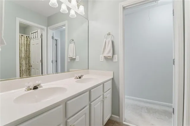 a living room with furniture and windows