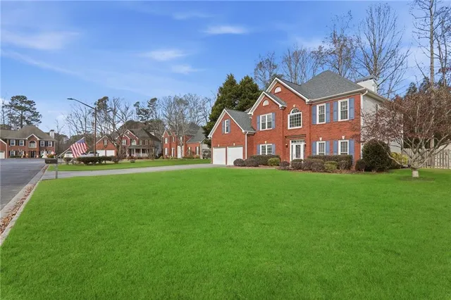 a view of a backyard with garden