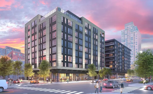 a view of a tall building from a street