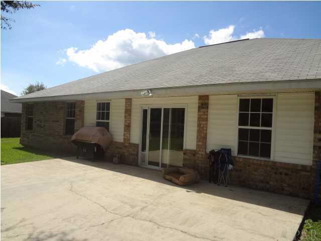 7104 Jennifer Road Pensacola, FL 32526 - Photo 21 of 25 REAR VIEW, OPEN PATIO