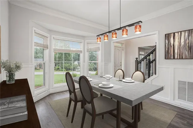 a view of a dining room with furniture window and outside view