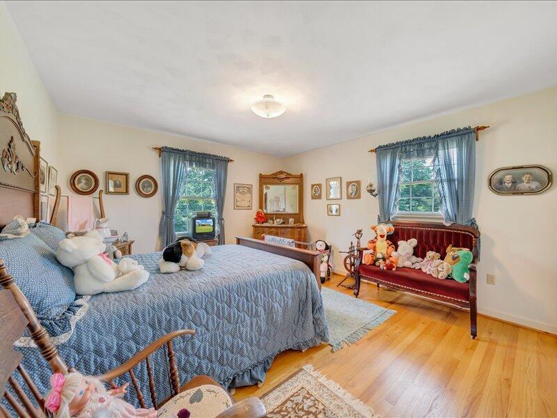 1091 Cool Rock Road Vinton, VA 24179 - Photo 23 of 44 a bedroom with bed and window