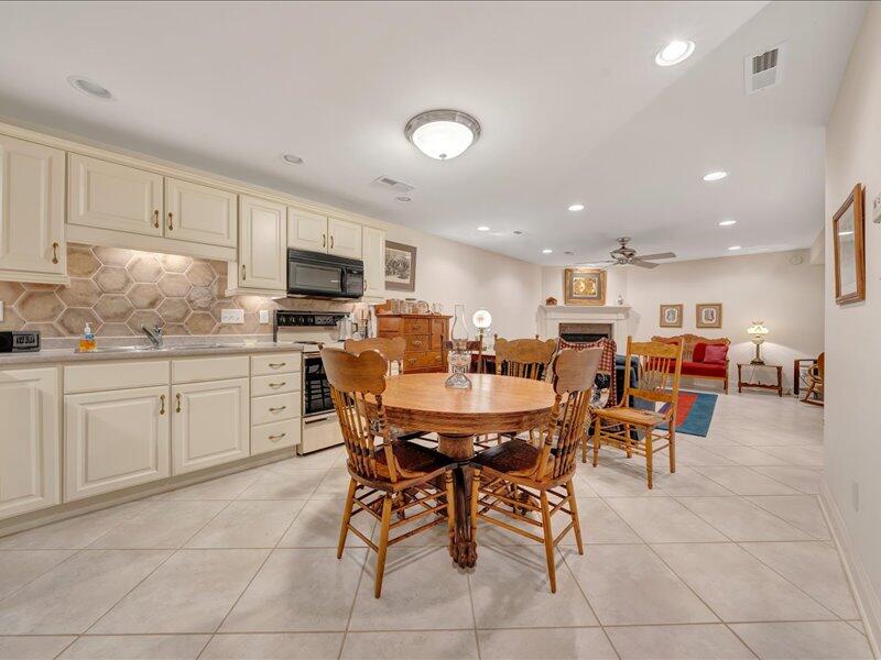 1091 Cool Rock Road Vinton, VA 24179 - Photo 31 of 44 a open dining room with stainless steel appliances a dining table and chairs