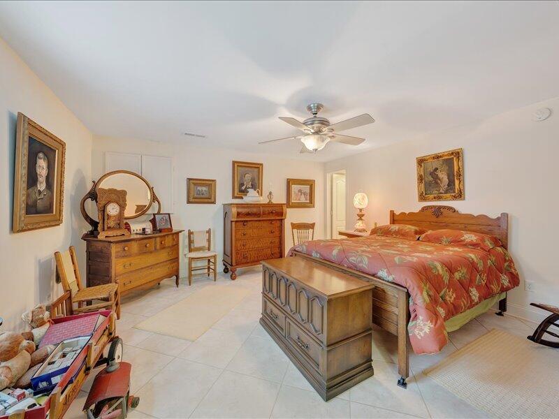 1091 Cool Rock Road Vinton, VA 24179 - Photo 35 of 44 a spacious bedroom with a bed and furniture