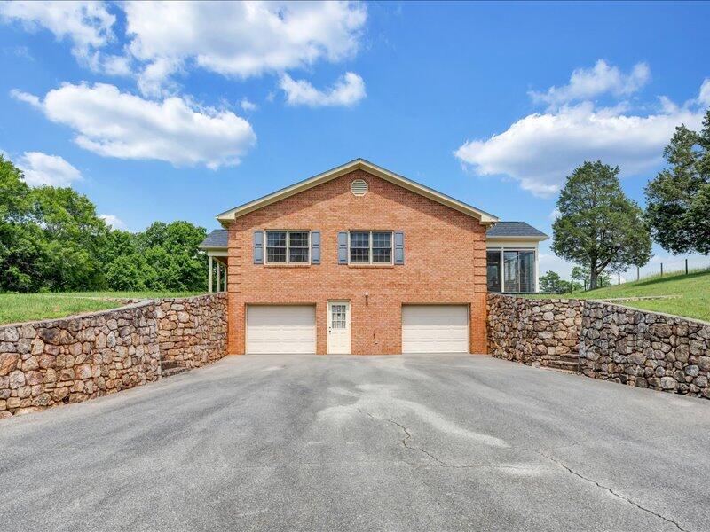 1091 Cool Rock Road Vinton, VA 24179 - Photo 39 of 44 a front view of a house with a yard