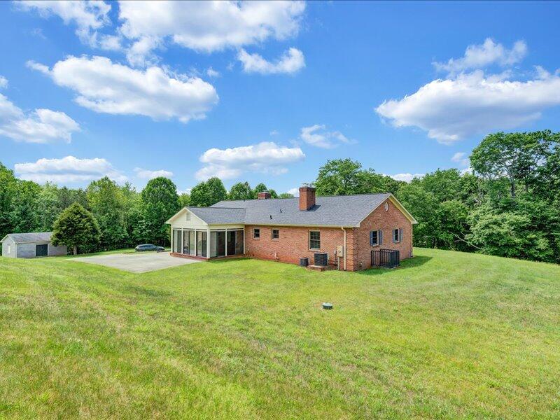 1091 Cool Rock Road Vinton, VA 24179 - Photo 40 of 44 a house with swimming pool in front of it