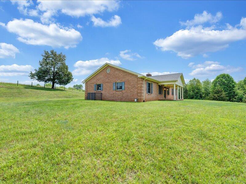 1091 Cool Rock Road Vinton, VA 24179 - Photo 41 of 44 a view of a house with a yard