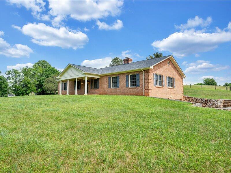 1091 Cool Rock Road Vinton, VA 24179 - Photo 42 of 44 a view of a house with a backyard