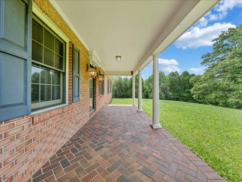 1091 Cool Rock Road Vinton, VA 24179 - Photo 43 of 44 a view of a house with backyard and garden