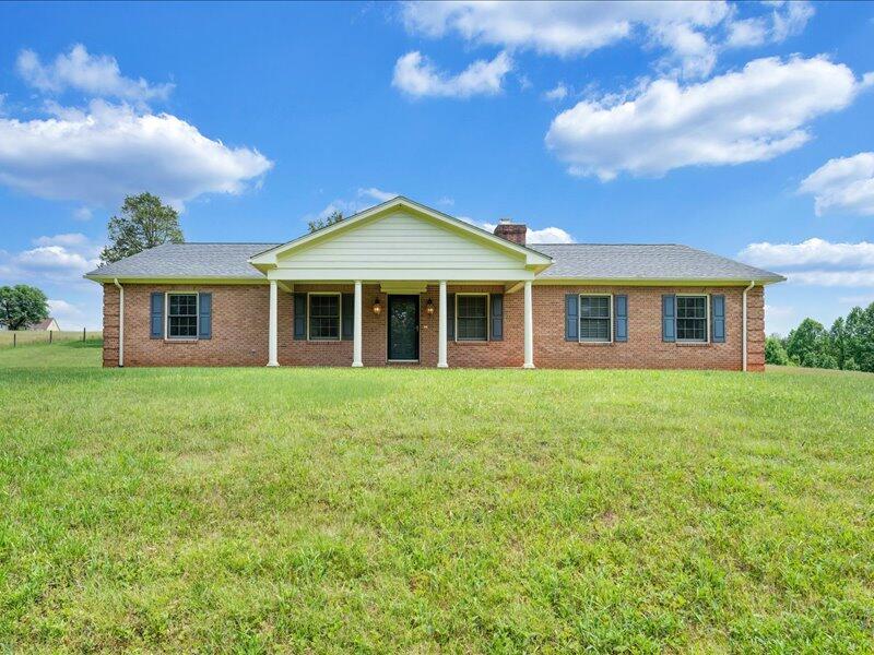 1091 Cool Rock Road Vinton, VA 24179 - Photo 44 of 44 a front view of a house with a garden