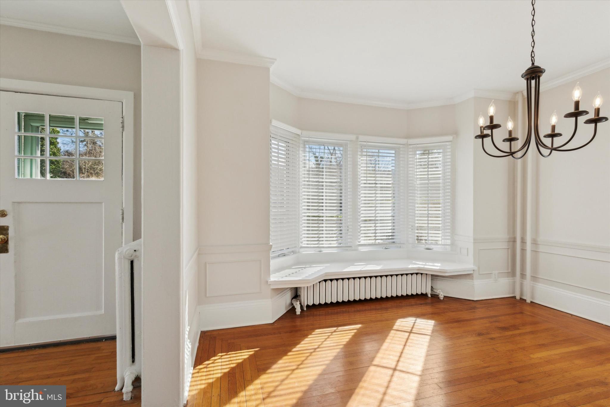 1329 Olive Street Coatesville, PA 19320 - Photo 12 of 35 a view of an empty room with glass door and windows