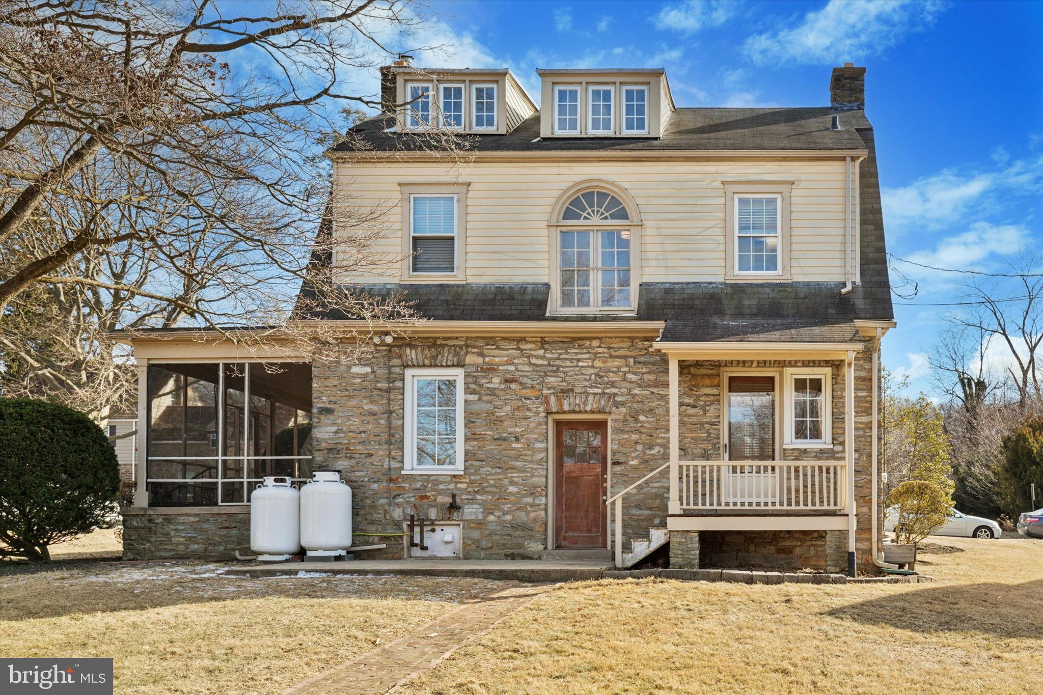 1329 Olive Street Coatesville, PA 19320 - Photo 17 of 35 a front view of a house with a yard