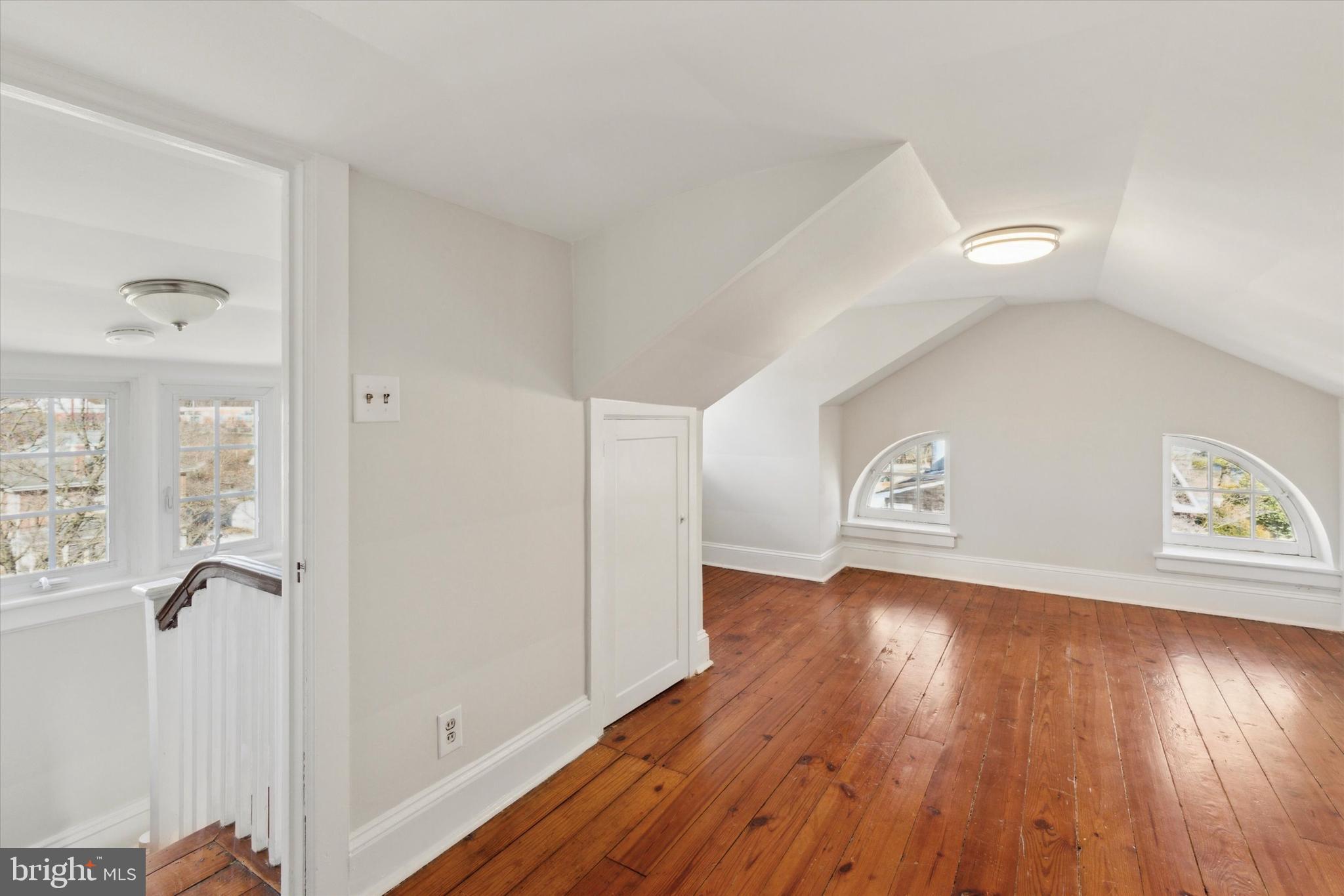 1329 Olive Street Coatesville, PA 19320 - Photo 28 of 35 a view of an empty room and wooden floor