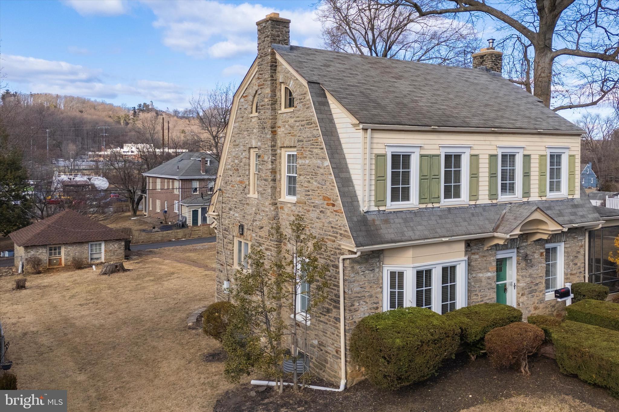 1329 Olive Street Coatesville, PA 19320 - Photo 34 of 35 a view of a brick house with many windows