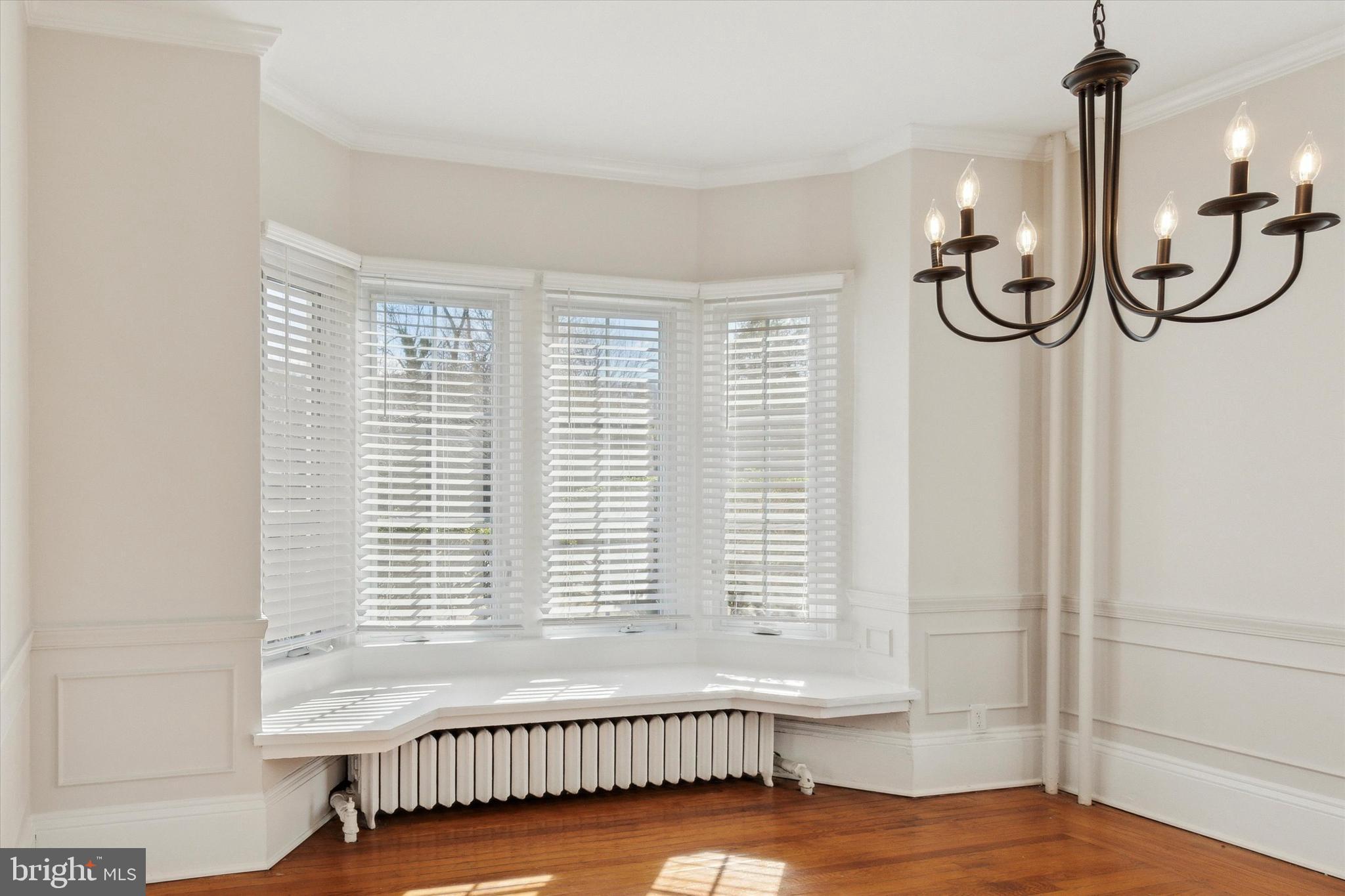 1329 Olive Street Coatesville, PA 19320 - Photo 9 of 35 a bathroom with a window and a table