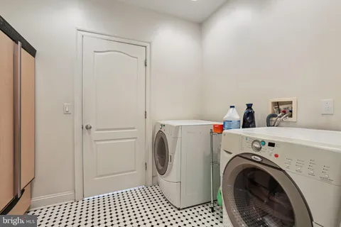 a view of washer and dryer in a utility room