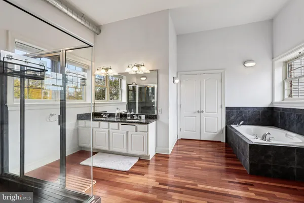 a kitchen with a sink and a refrigerator